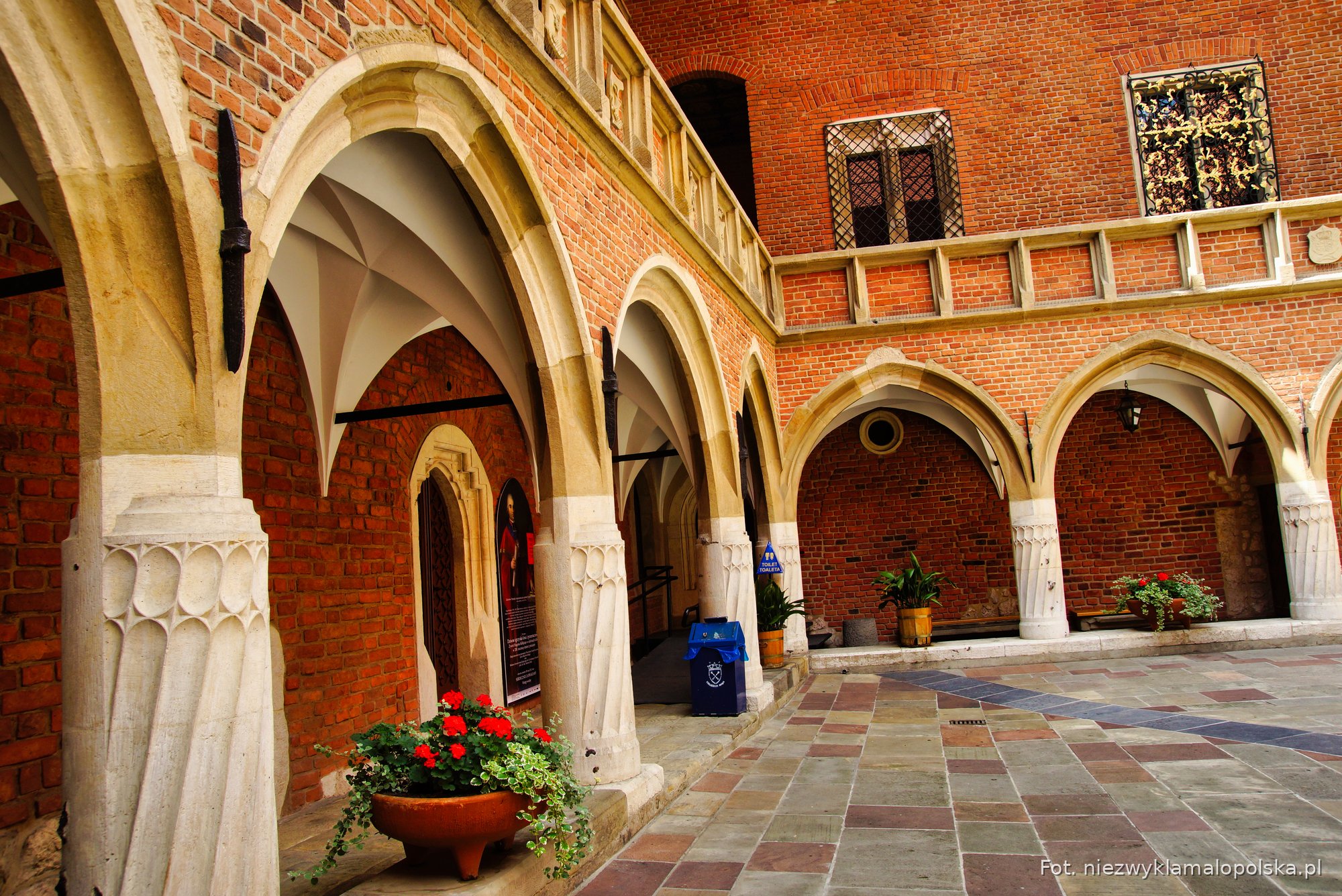 Gothic arches of the cloister around the Collegium Maius courtyard in Kraków