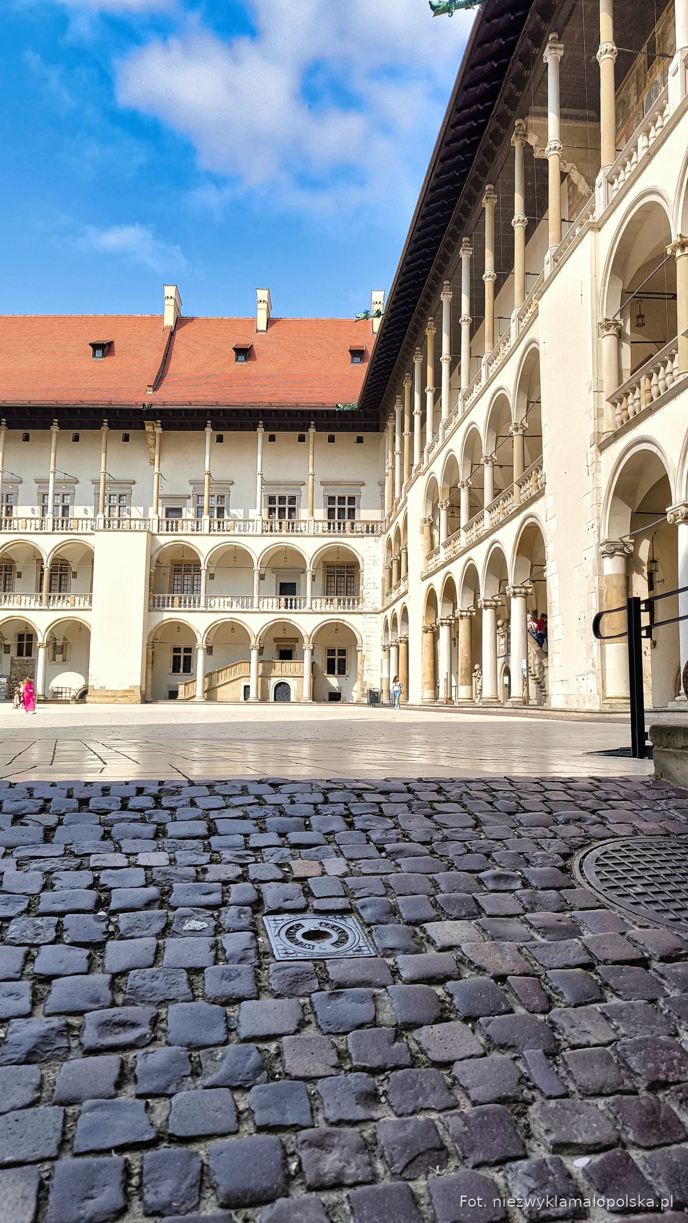 Arcades of the Wawel Castle courtyard seen from the ground